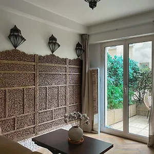 https://tour-eiffel-rnov-avec-jardin-privatif.fr-paris.fr